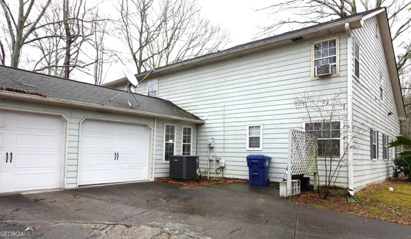 a view of a house with a garage