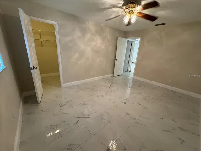 a view of a room with racks on the wall