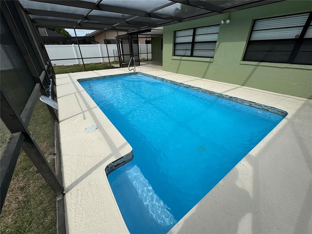 8725 Aruba Lane Port Richey, FL 34668 - Photo 7 of 31 a view of a balcony with staircase