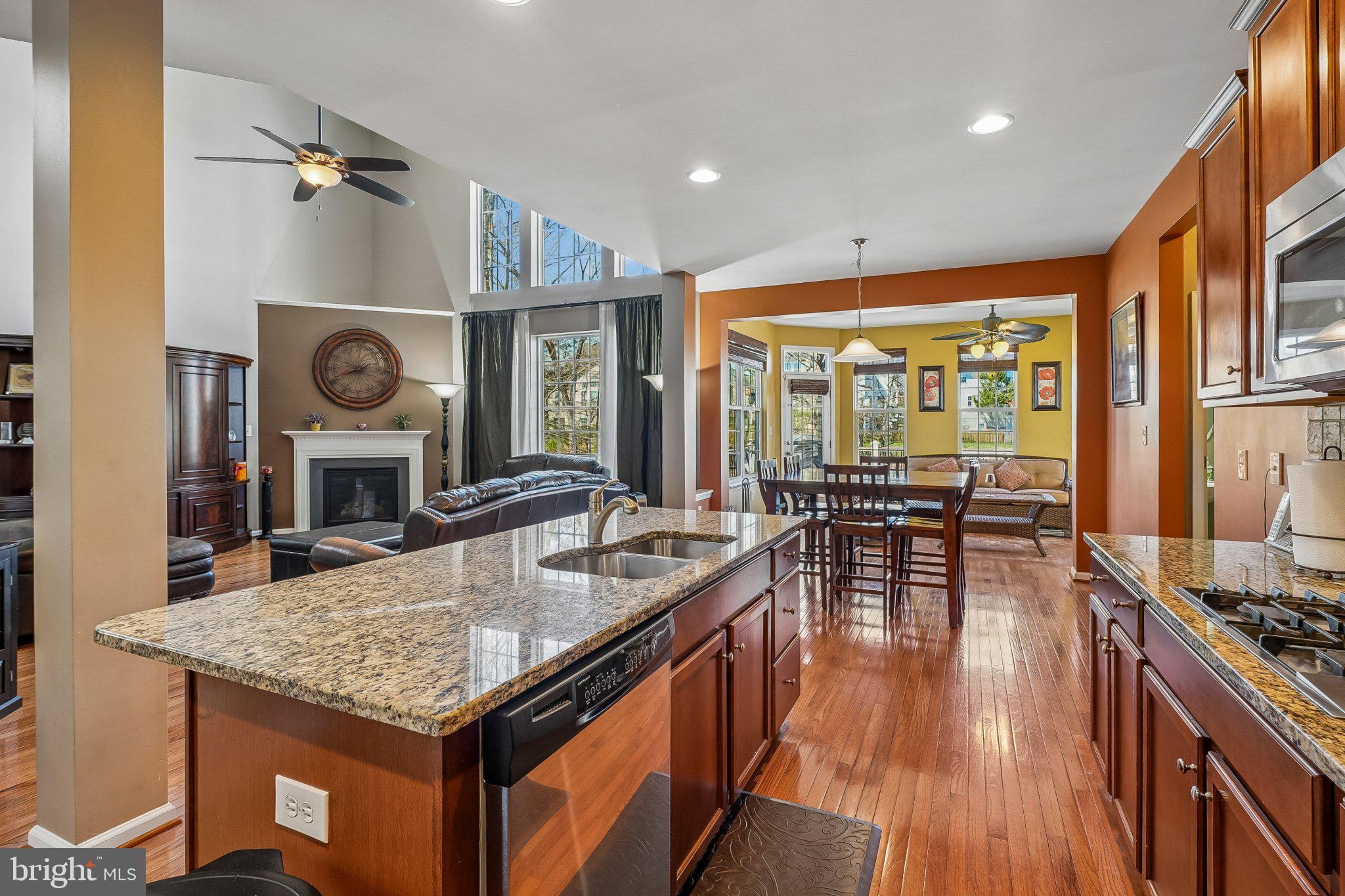 8716 Raleigh Mews Gainesville, VA 20155 - Photo 12 of 37 Spacious open-concept living area.