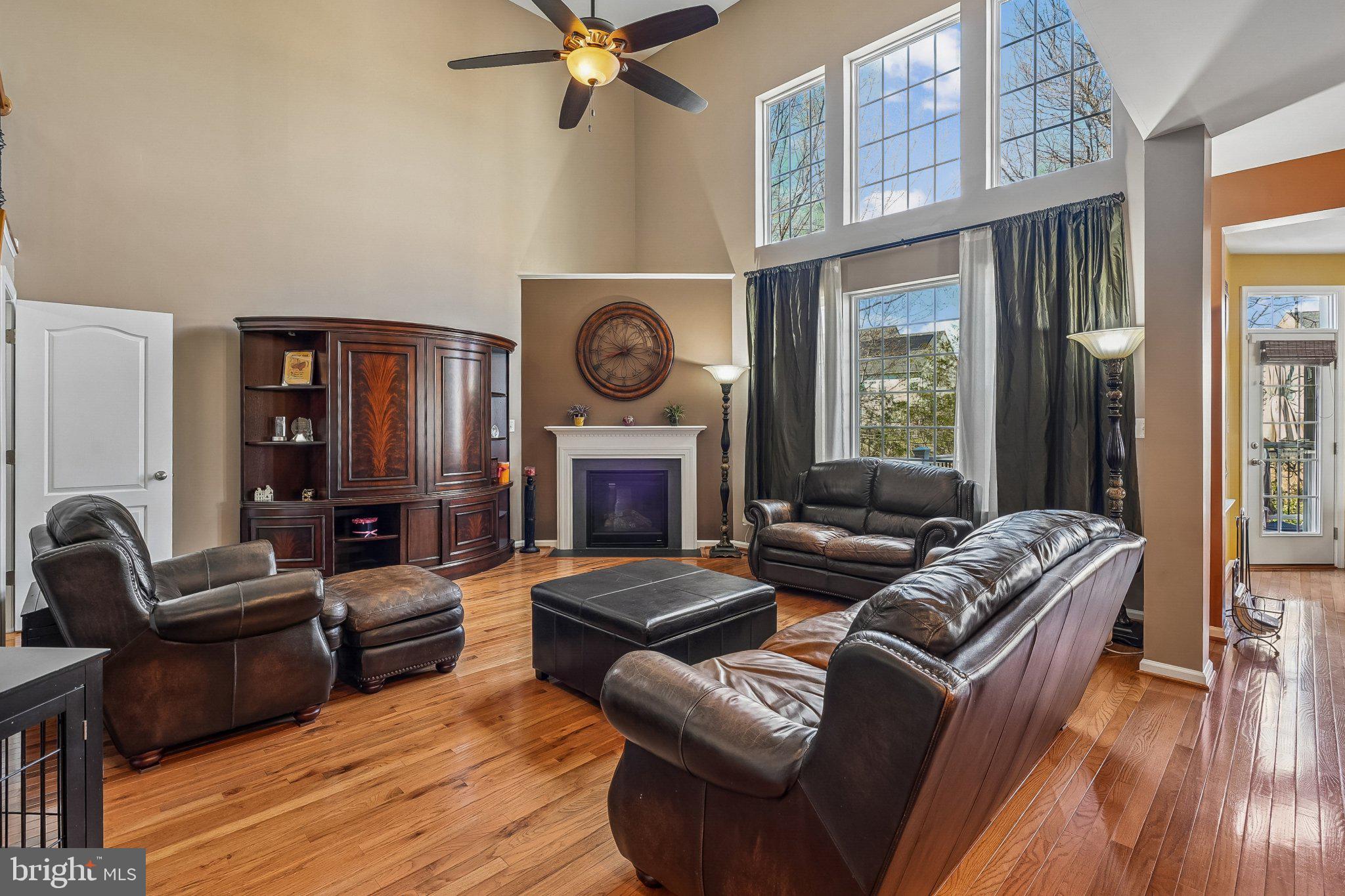 8716 Raleigh Mews Gainesville, VA 20155 - Photo 15 of 37 Spacious Family room with natural light.