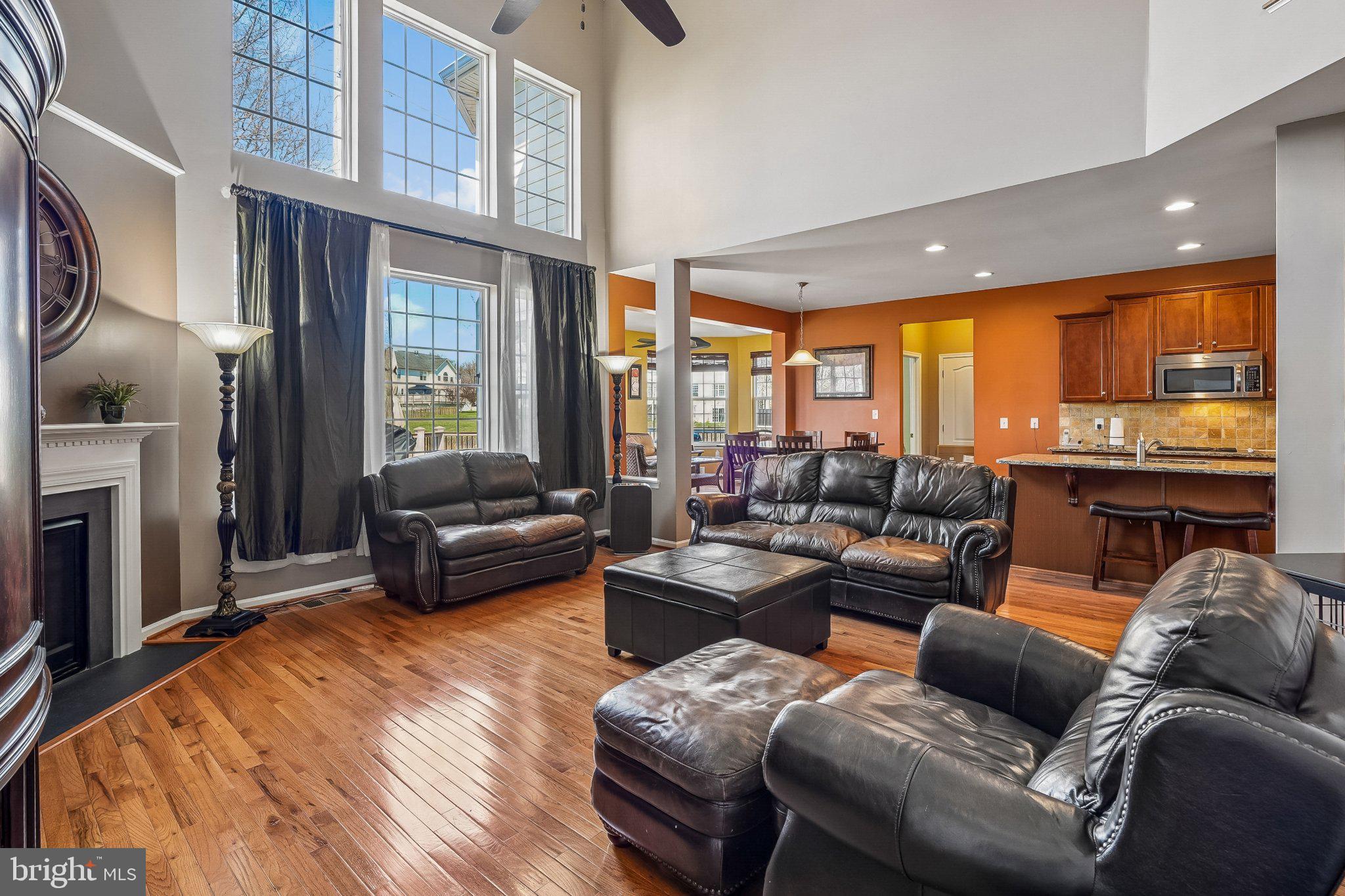 8716 Raleigh Mews Gainesville, VA 20155 - Photo 16 of 37 Spacious living area with natural light.