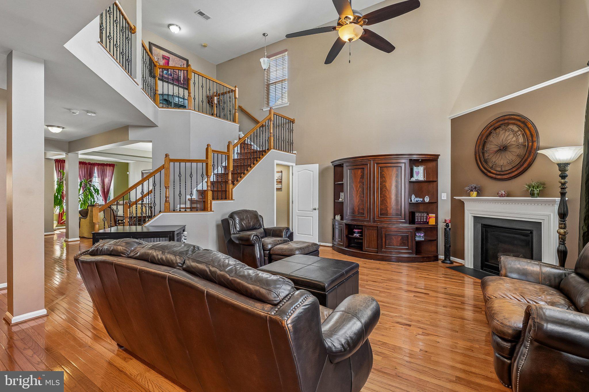 8716 Raleigh Mews Gainesville, VA 20155 - Photo 17 of 37 Spacious living area with elegant design.