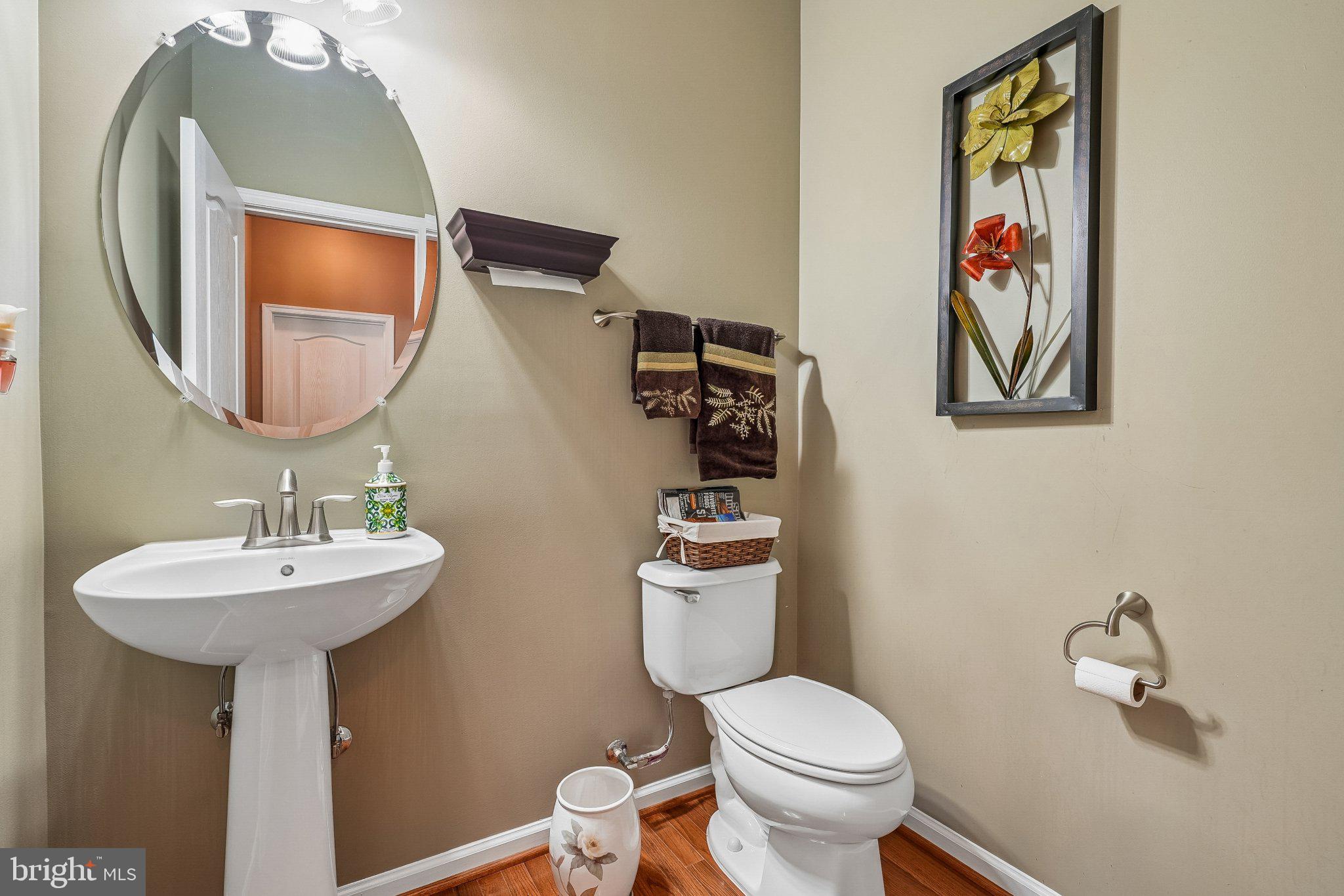 8716 Raleigh Mews Gainesville, VA 20155 - Photo 19 of 37 Charming half-bath with elegant decor.