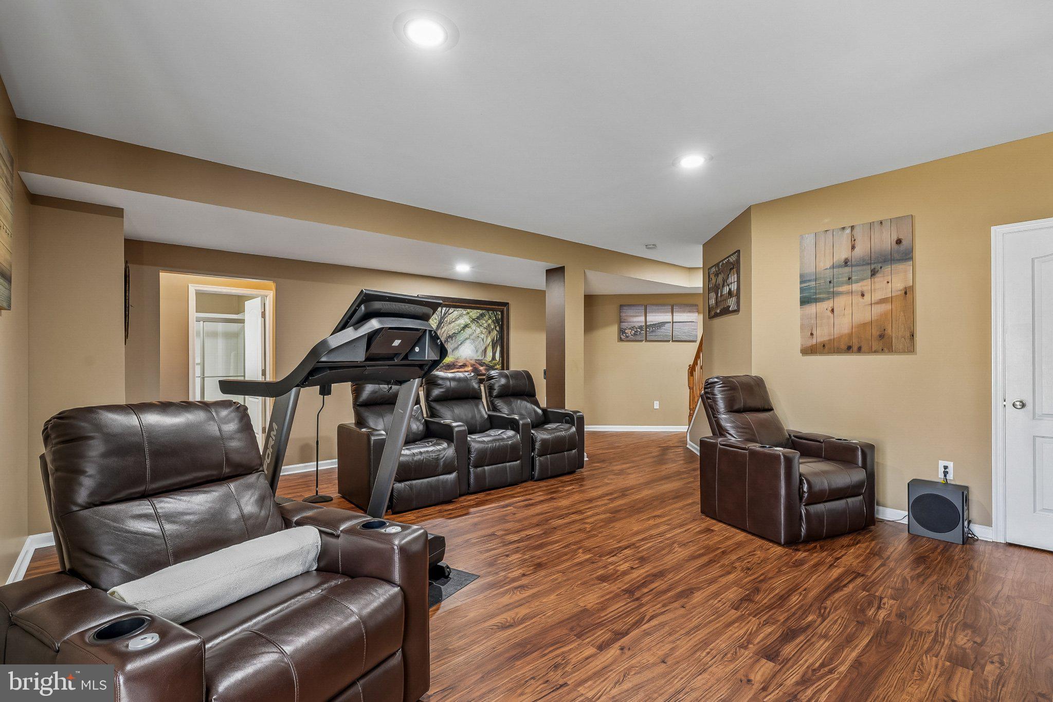 8716 Raleigh Mews Gainesville, VA 20155 - Photo 31 of 37 Spacious, inviting rec room retreat.