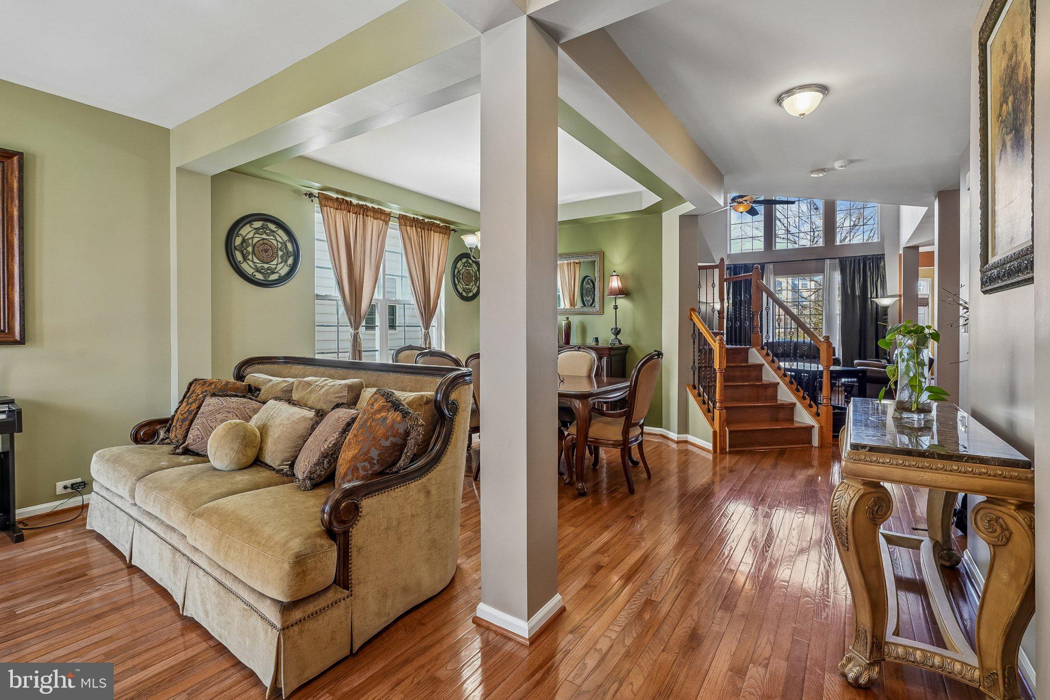 8716 Raleigh Mews Gainesville, VA 20155 - Photo 5 of 37 Elegant open-concept living space.