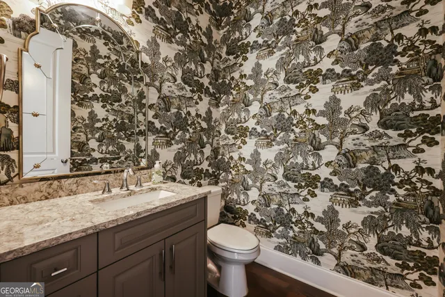 a bathroom with a shower a toilet and a shower