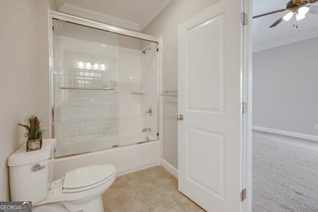 a kitchen with a stove and a refrigerator