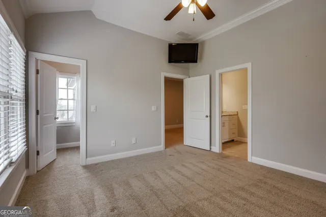 a kitchen with stainless steel appliances granite countertop a sink and a stove