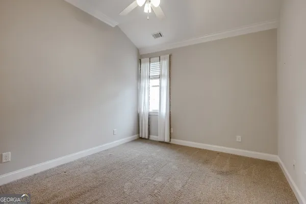 a kitchen with stainless steel appliances granite countertop a sink and a stove