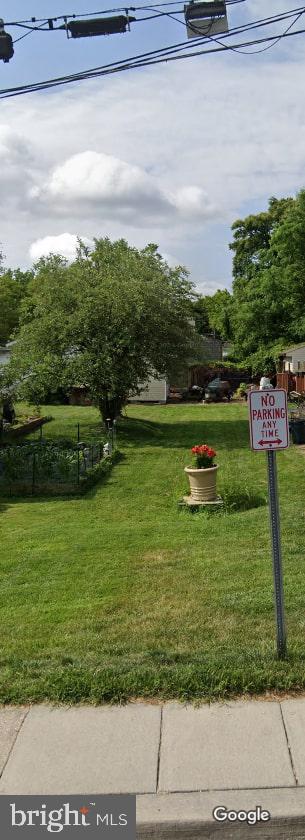 6107 Jost Street Capitol Heights, MD 20743 - Photo 2 of 2 a view of a garden with an outdoor space