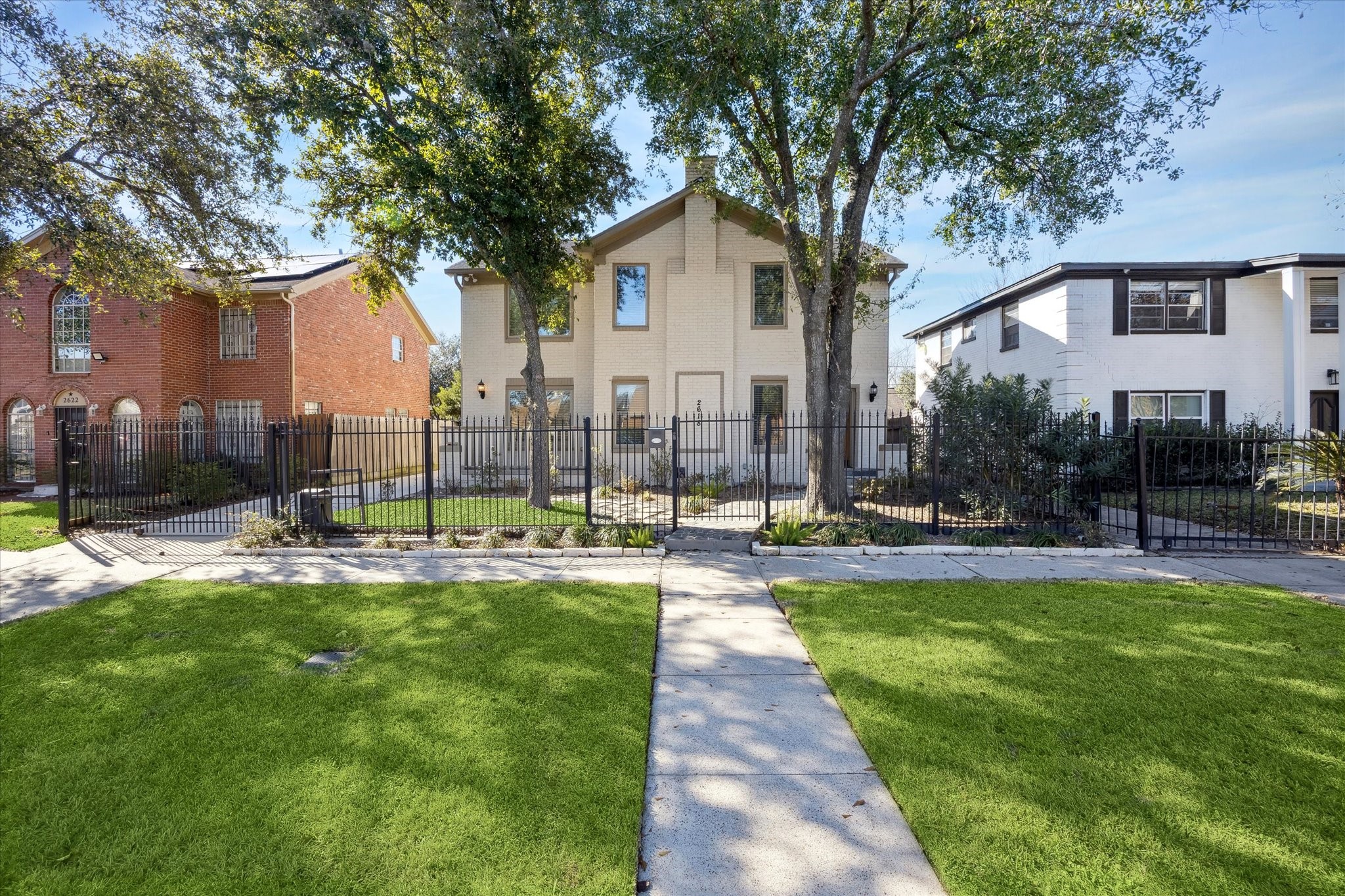 2618 Cleburne Street Houston, TX 77004 - Photo 1 of 25 a house view with a sitting space and garden
