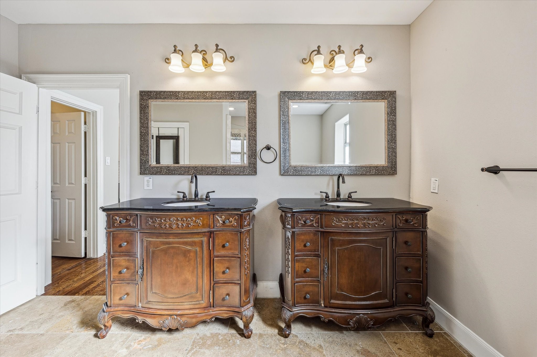 2618 Cleburne Street Houston, TX 77004 - Photo 13 of 25 a hall with a sink and a mirror