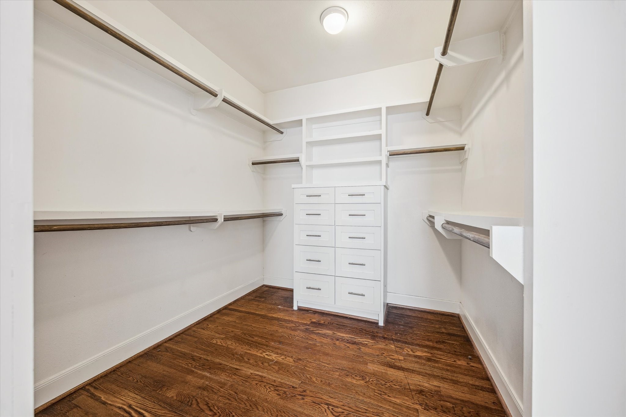 2618 Cleburne Street Houston, TX 77004 - Photo 17 of 25 a view of walk in closet with empty racks