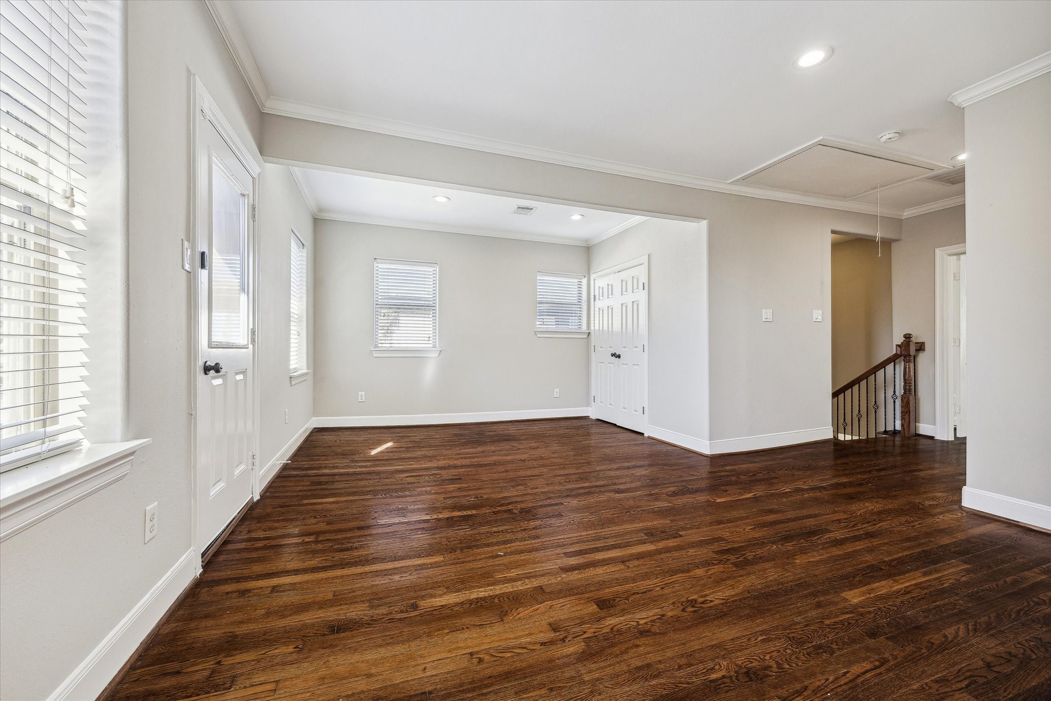 2618 Cleburne Street Houston, TX 77004 - Photo 20 of 25 a view of an empty room with wooden floor and a window