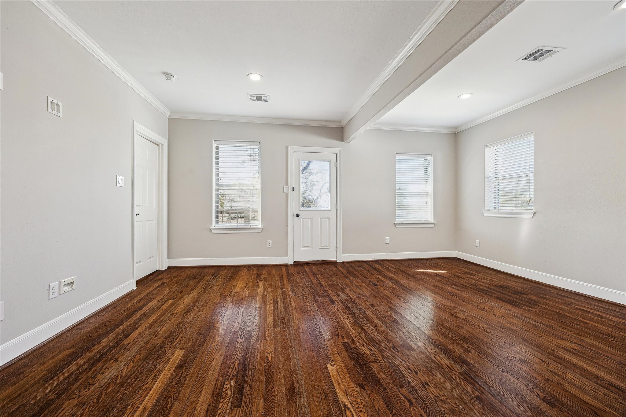 2618 Cleburne Street Houston, TX 77004 - Photo 21 of 25 wooden floor in an empty room with a window