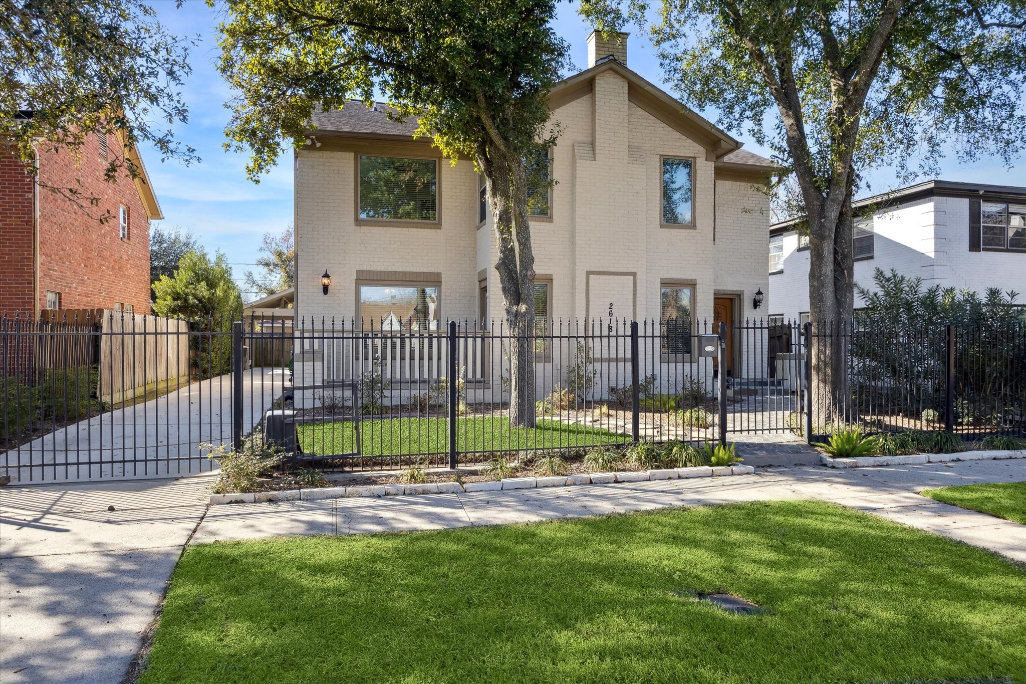 2618 Cleburne Street Houston, TX 77004 - Photo 25 of 25 a view of backyard with small garden and trees