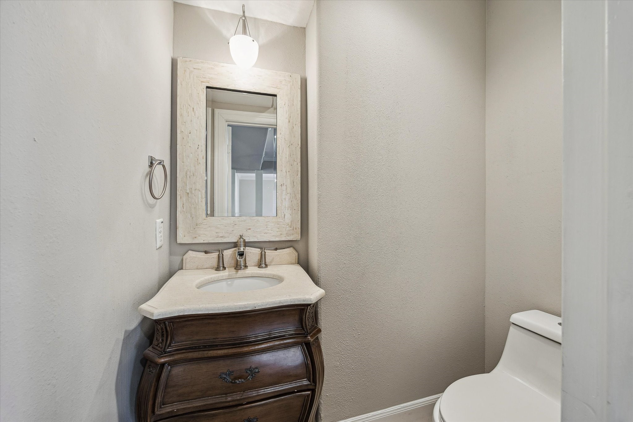 2618 Cleburne Street Houston, TX 77004 - Photo 10 of 25 a bathroom with a sink toilet and mirror