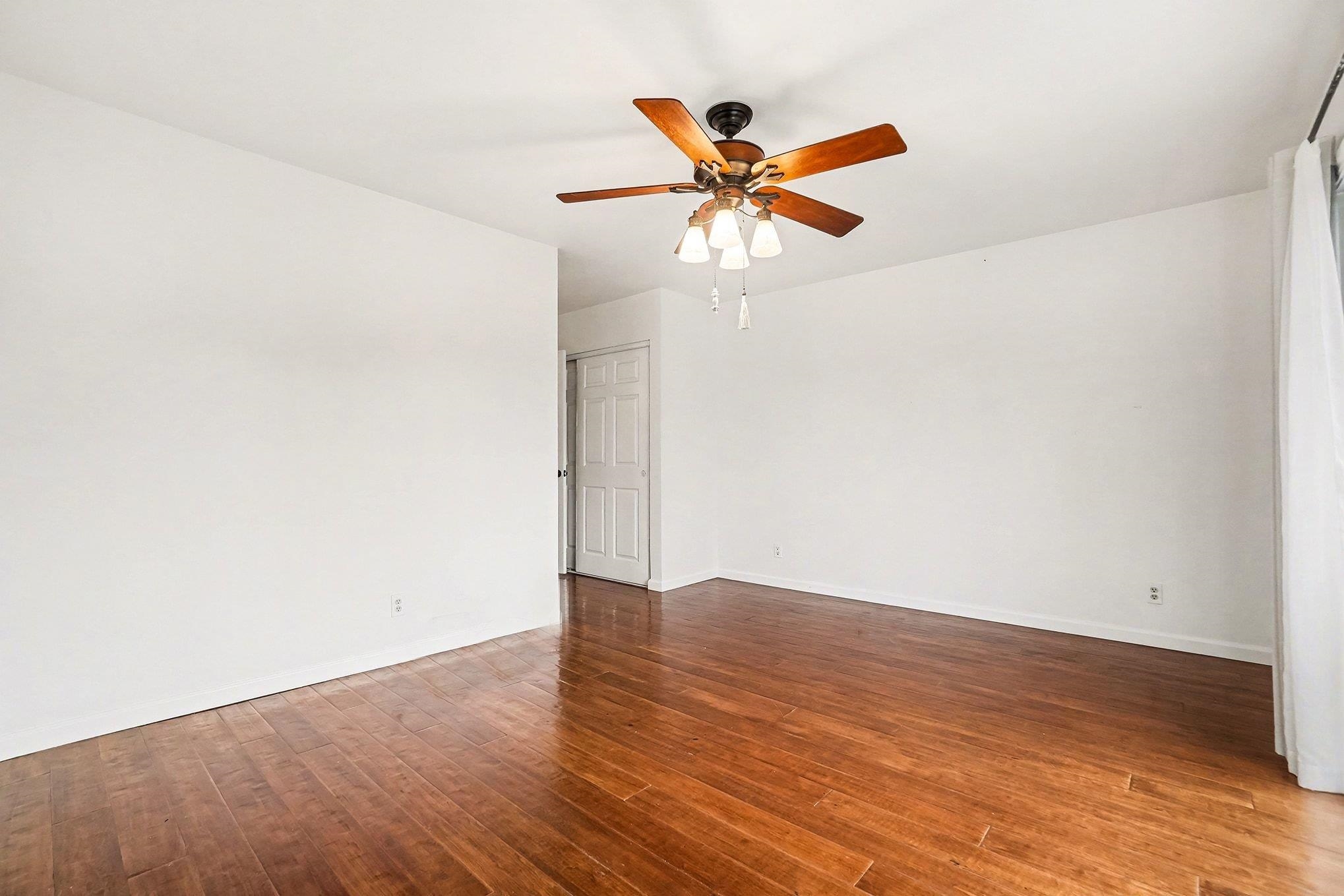 1833 Camino Estrada Concord, CA 94521 - Photo 15 of 25 a view of a room with wooden floor closet and a window