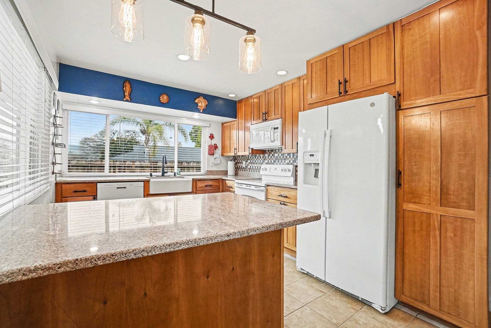 1833 Camino Estrada Concord, CA 94521 - Photo 4 of 25 a view of a kitchen with stainless steel appliances granite countertop a refrigerator a stove and a sink