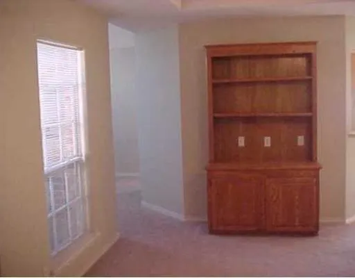 an empty room with closet