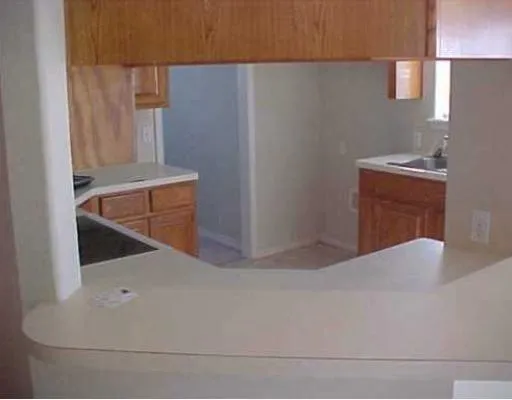 a view of staircase and living room