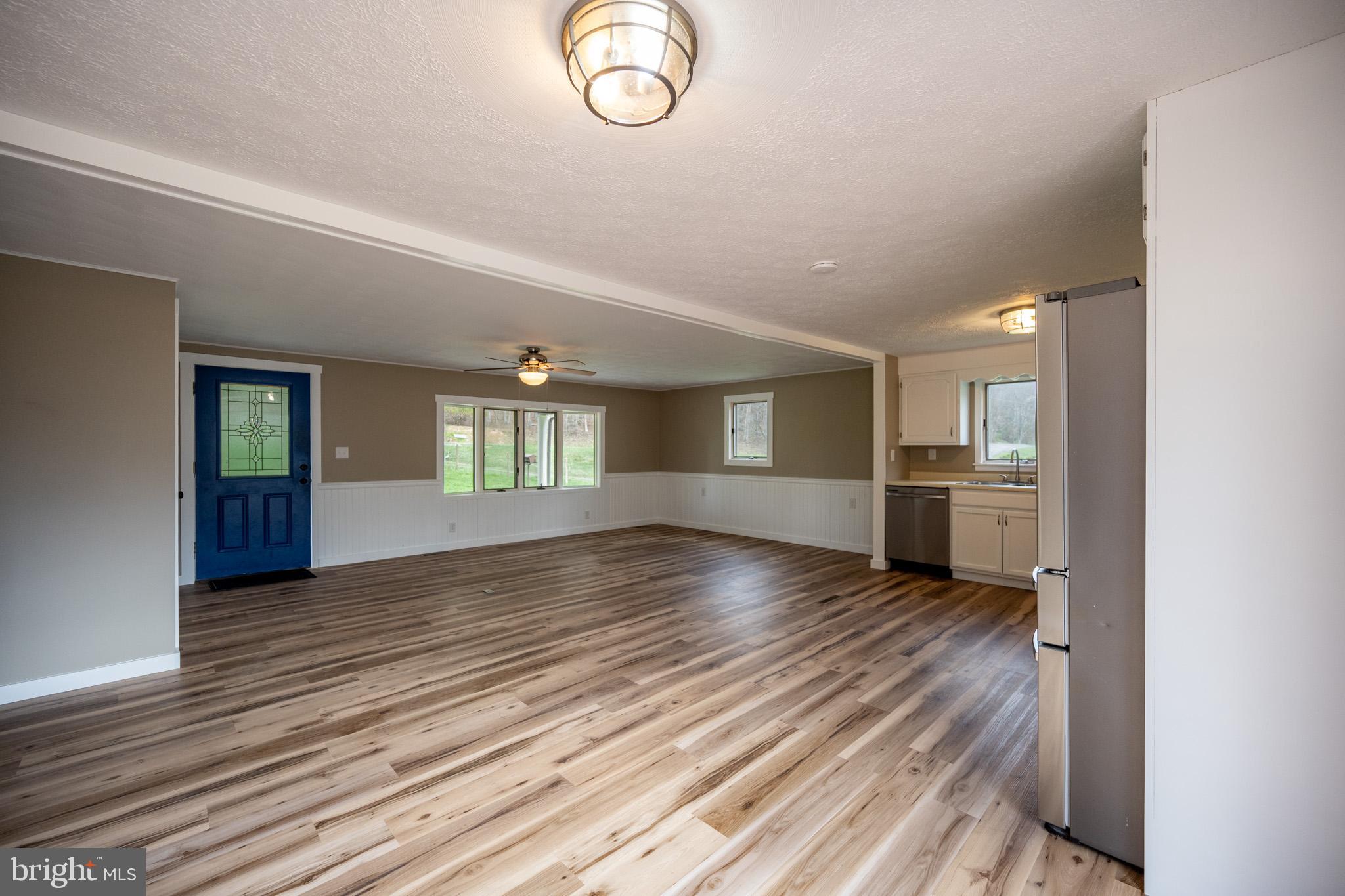 2571 Shady Dell Road Oakland, MD 21550 - Photo 12 of 60 a view of empty room with wooden floor