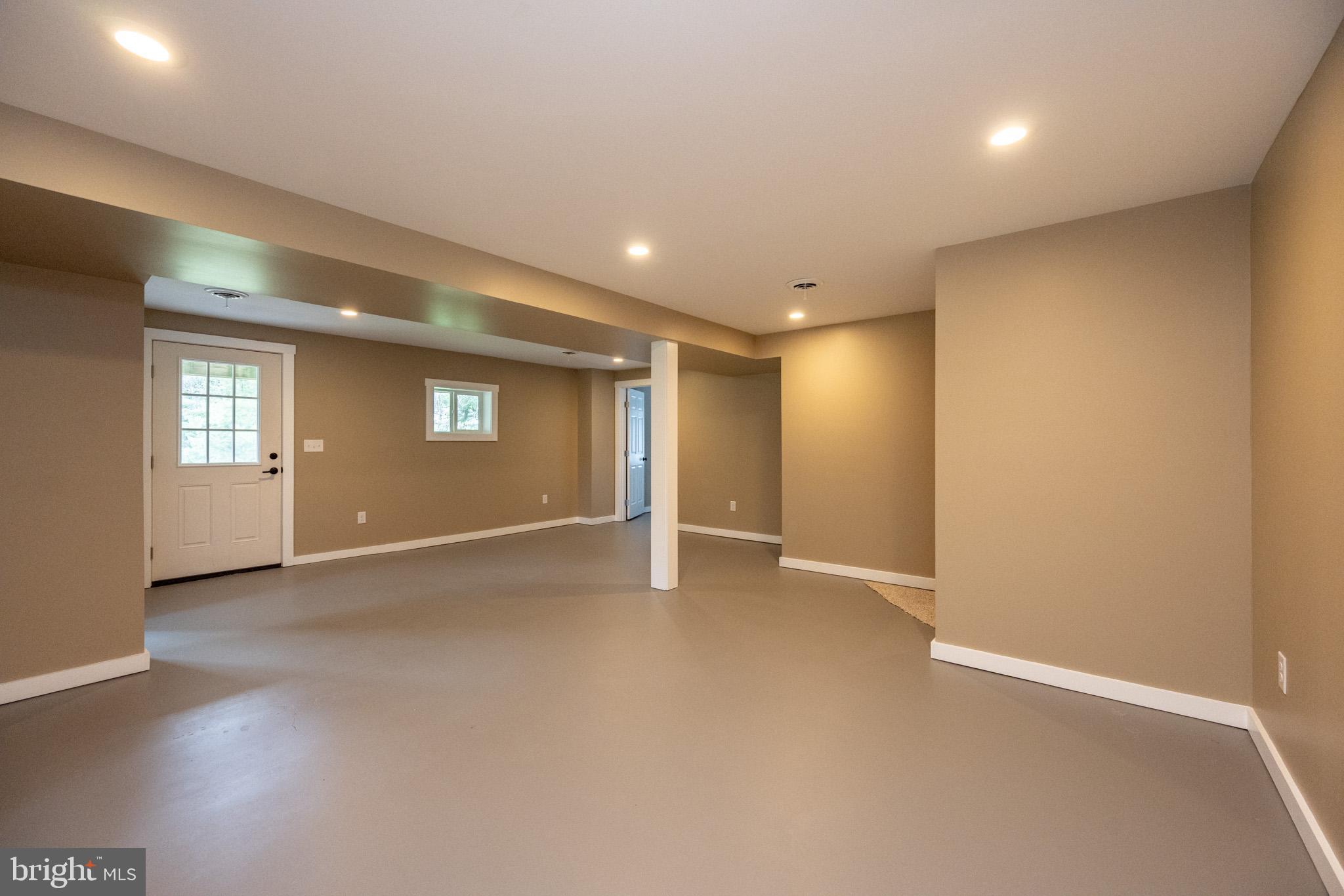 2571 Shady Dell Road Oakland, MD 21550 - Photo 28 of 60 an empty room with windows