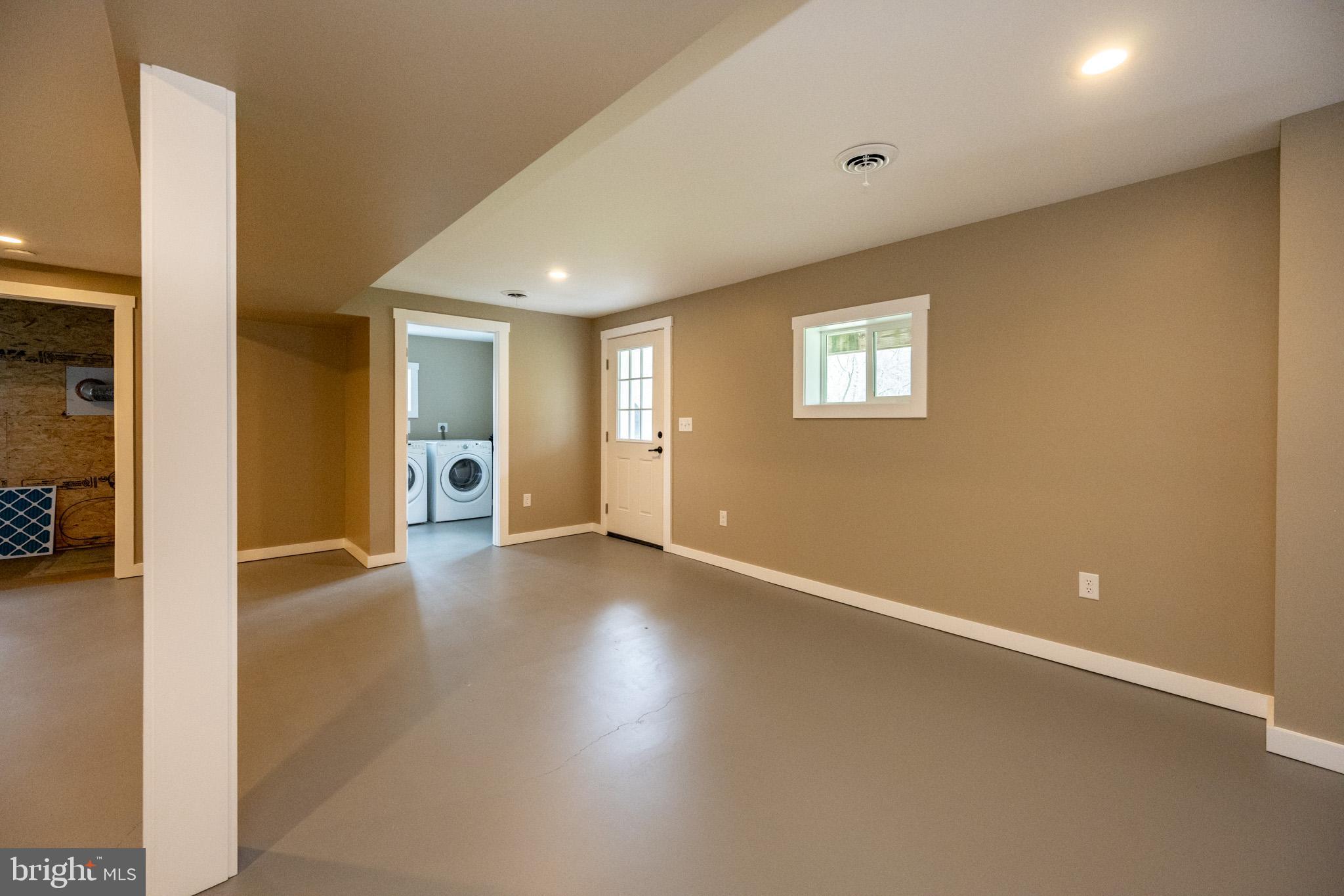 2571 Shady Dell Road Oakland, MD 21550 - Photo 32 of 60 a view of a livingroom with a staircase