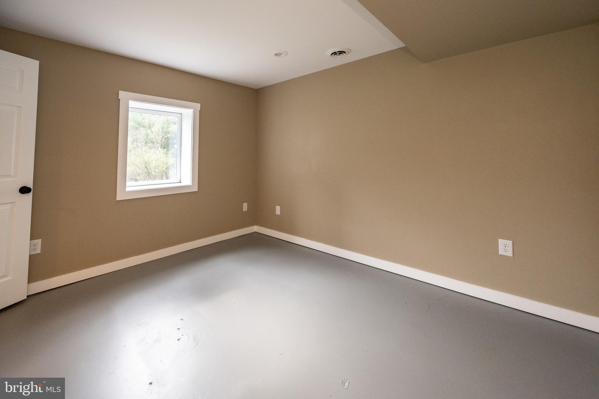 2571 Shady Dell Road Oakland, MD 21550 - Photo 35 of 60 an empty room with a window