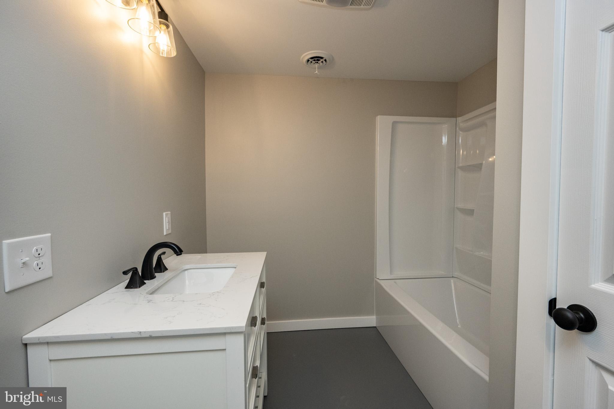 2571 Shady Dell Road Oakland, MD 21550 - Photo 38 of 60 a bathroom with a sink and a vanity