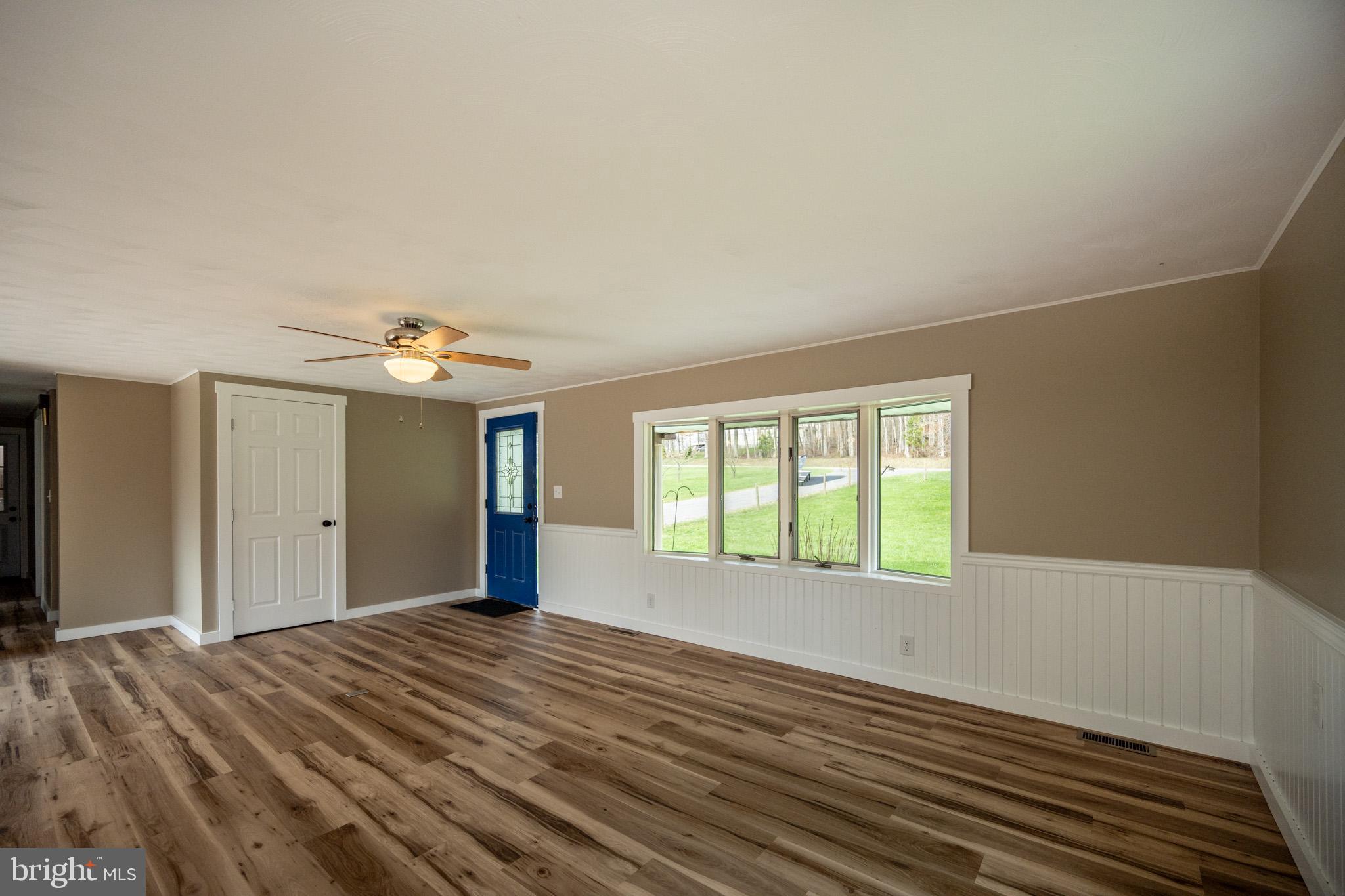2571 Shady Dell Road Oakland, MD 21550 - Photo 4 of 60 a bedroom with a bed and a window