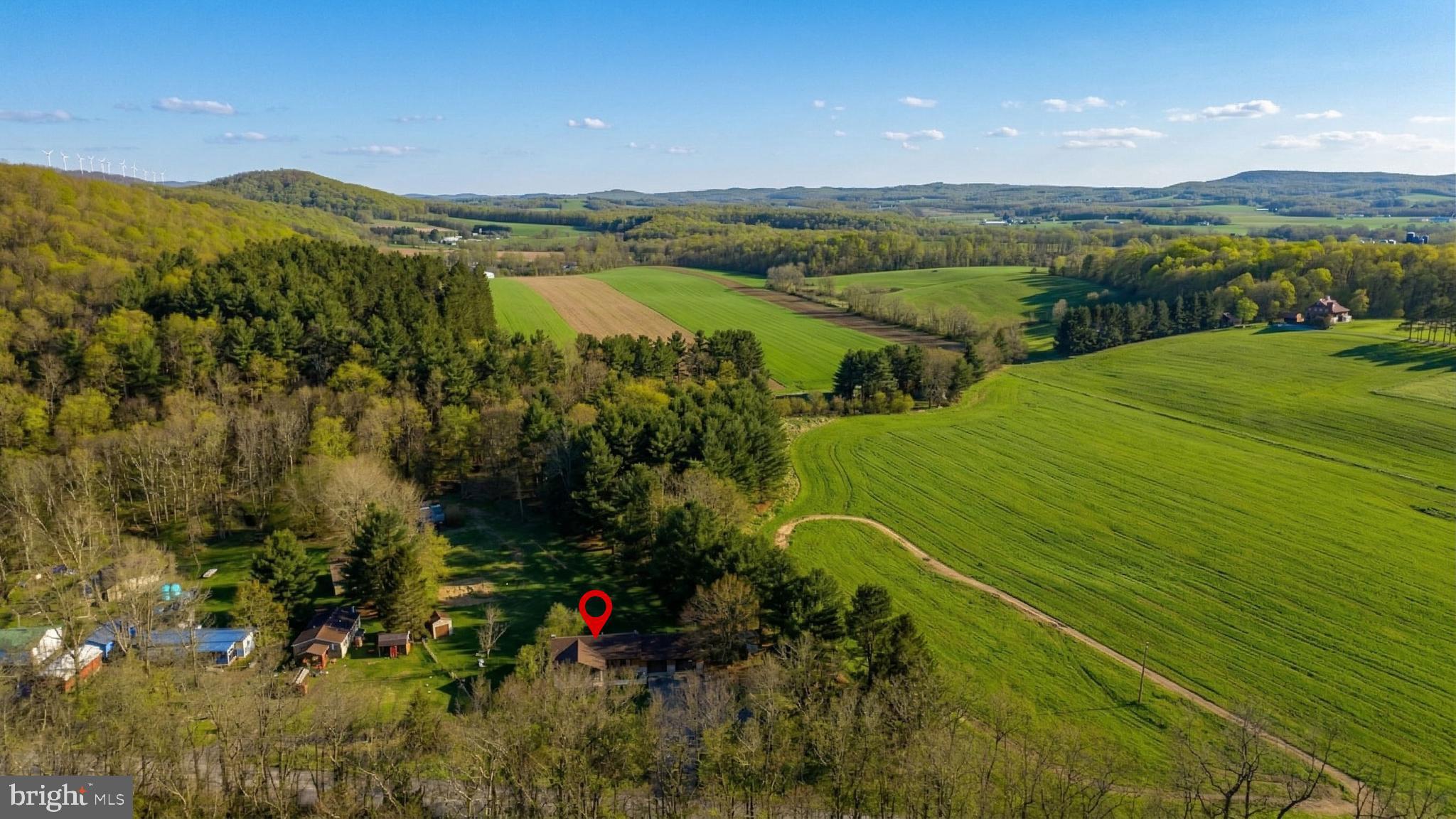 2571 Shady Dell Road Oakland, MD 21550 - Photo 60 of 60 a view of a lake with a mountain in the background