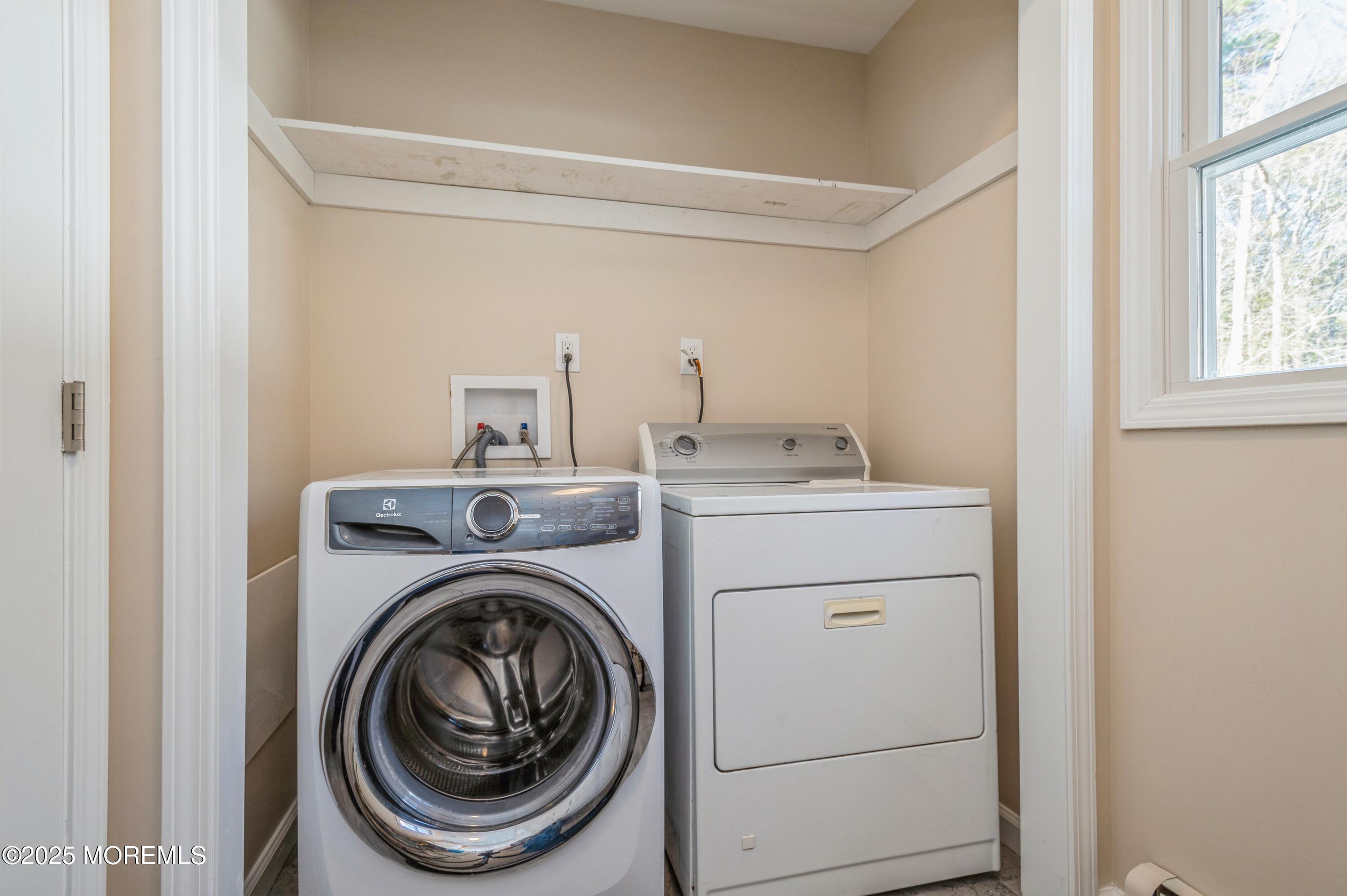 59 Harbor Inn Road Bayville, NJ 08721 - Photo 19 of 25 a utility room with dryer and washer