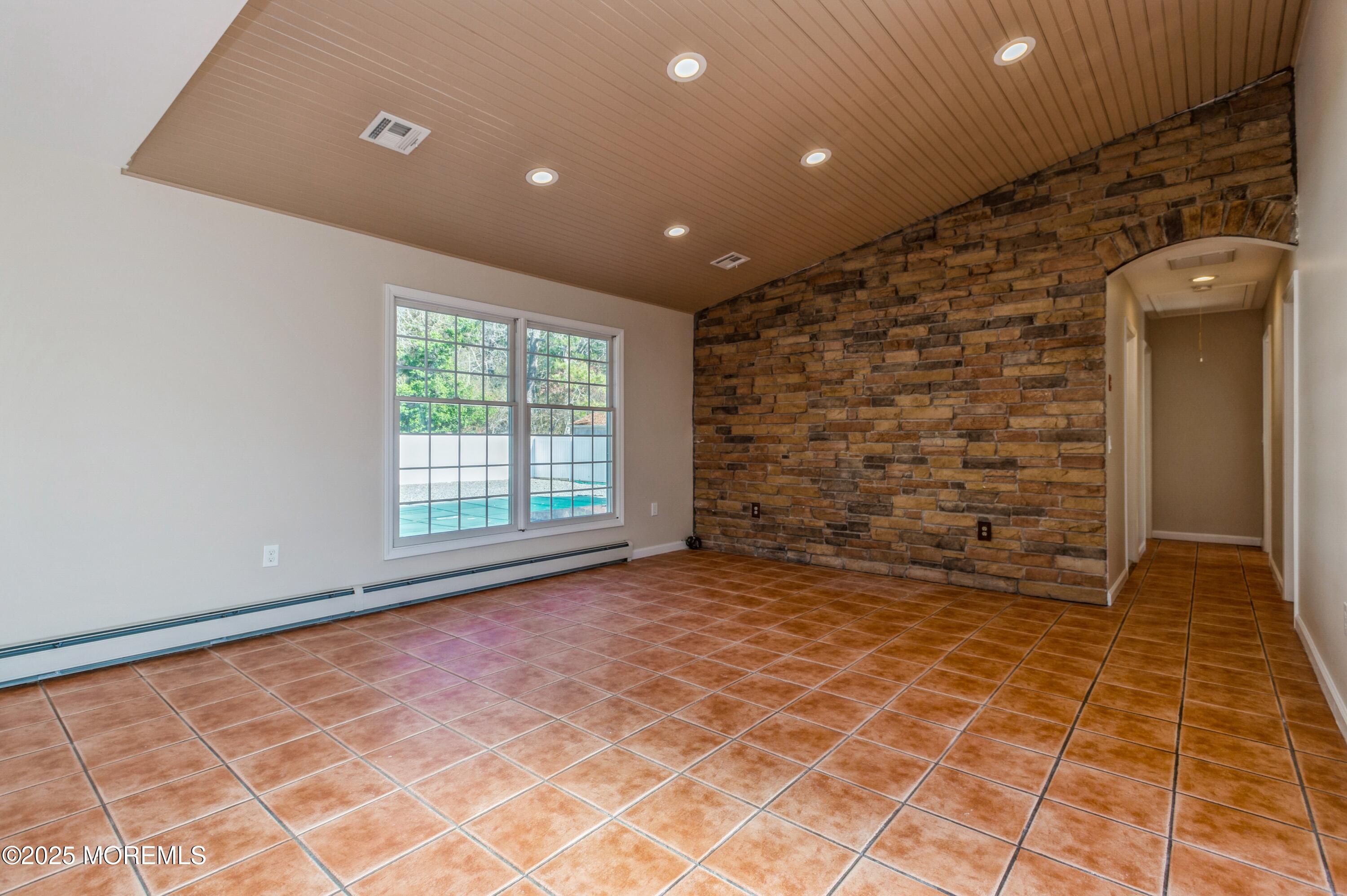 59 Harbor Inn Road Bayville, NJ 08721 - Photo 3 of 25 a view of empty room with windows