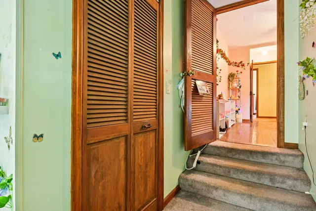 a bathroom with a tub and a shower