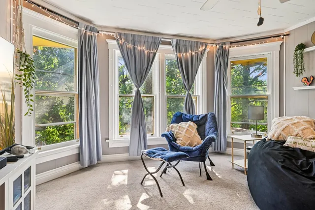 a kitchen with a stove a sink and a refrigerator