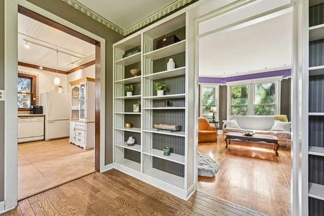 a kitchen with granite countertop a sink and cabinets