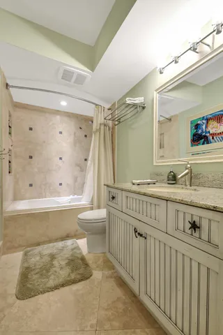 a view of a house with a street