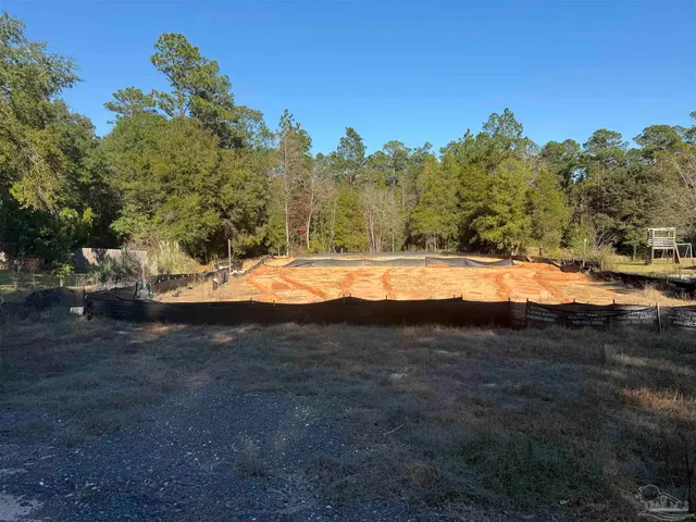 a view of a road with an outdoor space