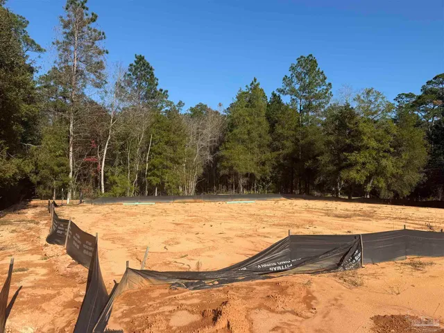 a view of a swimming pool with an outdoor space