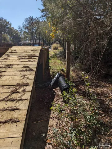 a view of a lake with a yard