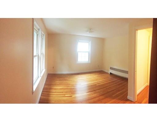 52 Meadowbrook Road Brookline, MA 02467 - Photo 15 of 20 a open hall with wooden floor and windows