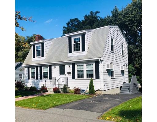 52 Meadowbrook Road Brookline, MA 02467 - Photo 2 of 20 a front view of a house with a garden