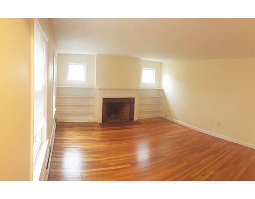 52 Meadowbrook Road Brookline, MA 02467 - Photo 4 of 20 a view of empty room with wooden floor