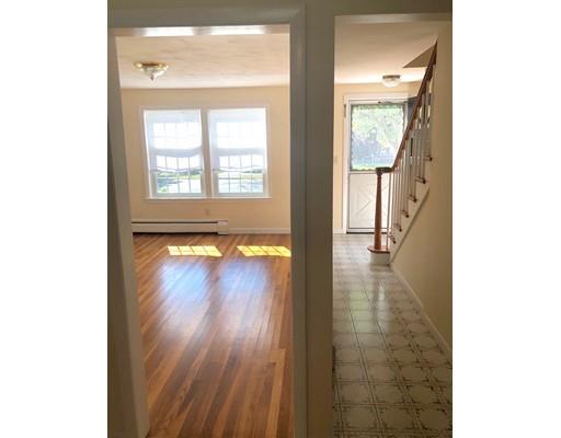 52 Meadowbrook Road Brookline, MA 02467 - Photo 5 of 20 a view of an entryway with wooden floor