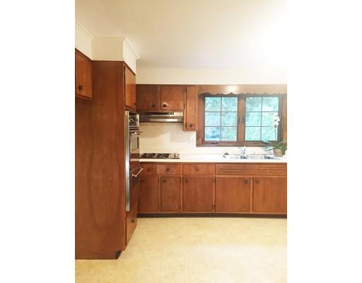 52 Meadowbrook Road Brookline, MA 02467 - Photo 7 of 20 a large kitchen with kitchen island a sink stainless steel appliances and cabinets