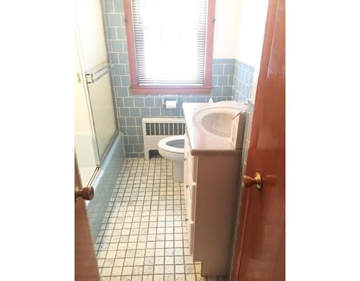 52 Meadowbrook Road Brookline, MA 02467 - Photo 8 of 20 a bathroom with a sink a toilet and shower