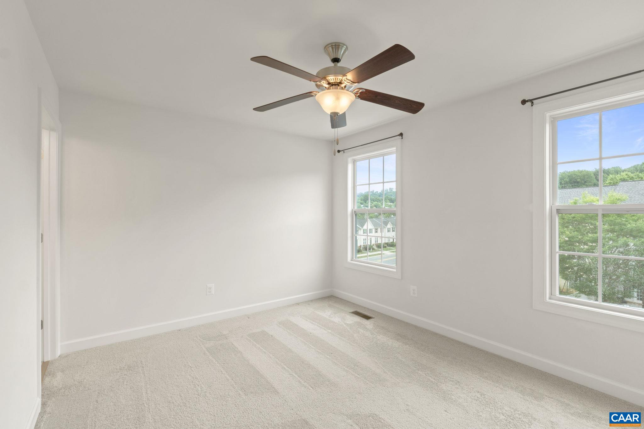 435 Rolkin Road Charlottesville, VA 22911 - Photo 17 of 56 a view of a livingroom with a ceiling fan and window