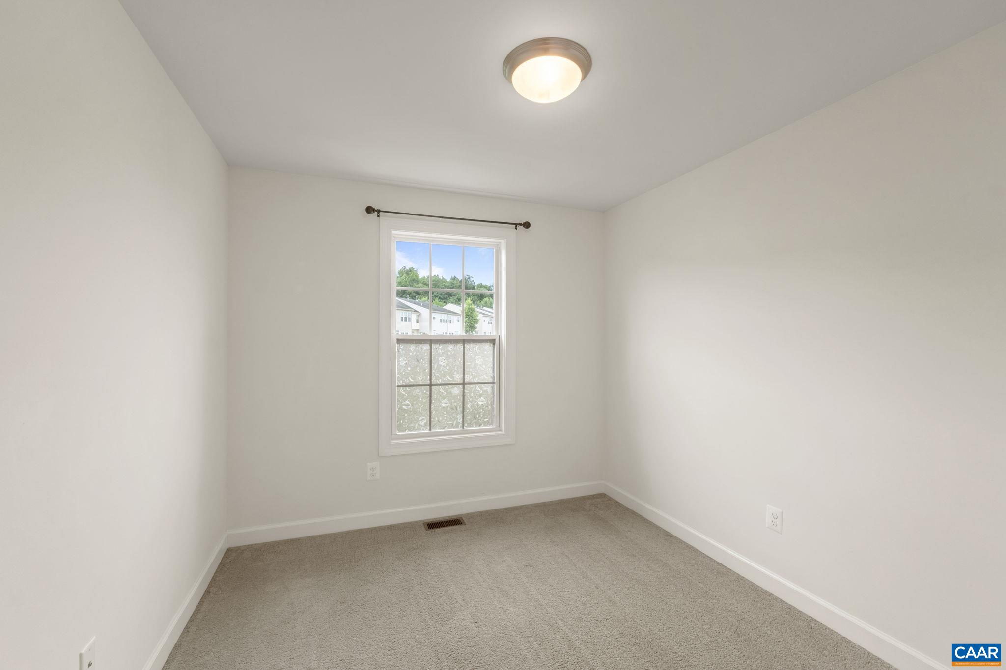435 Rolkin Road Charlottesville, VA 22911 - Photo 23 of 56 an empty room with a window